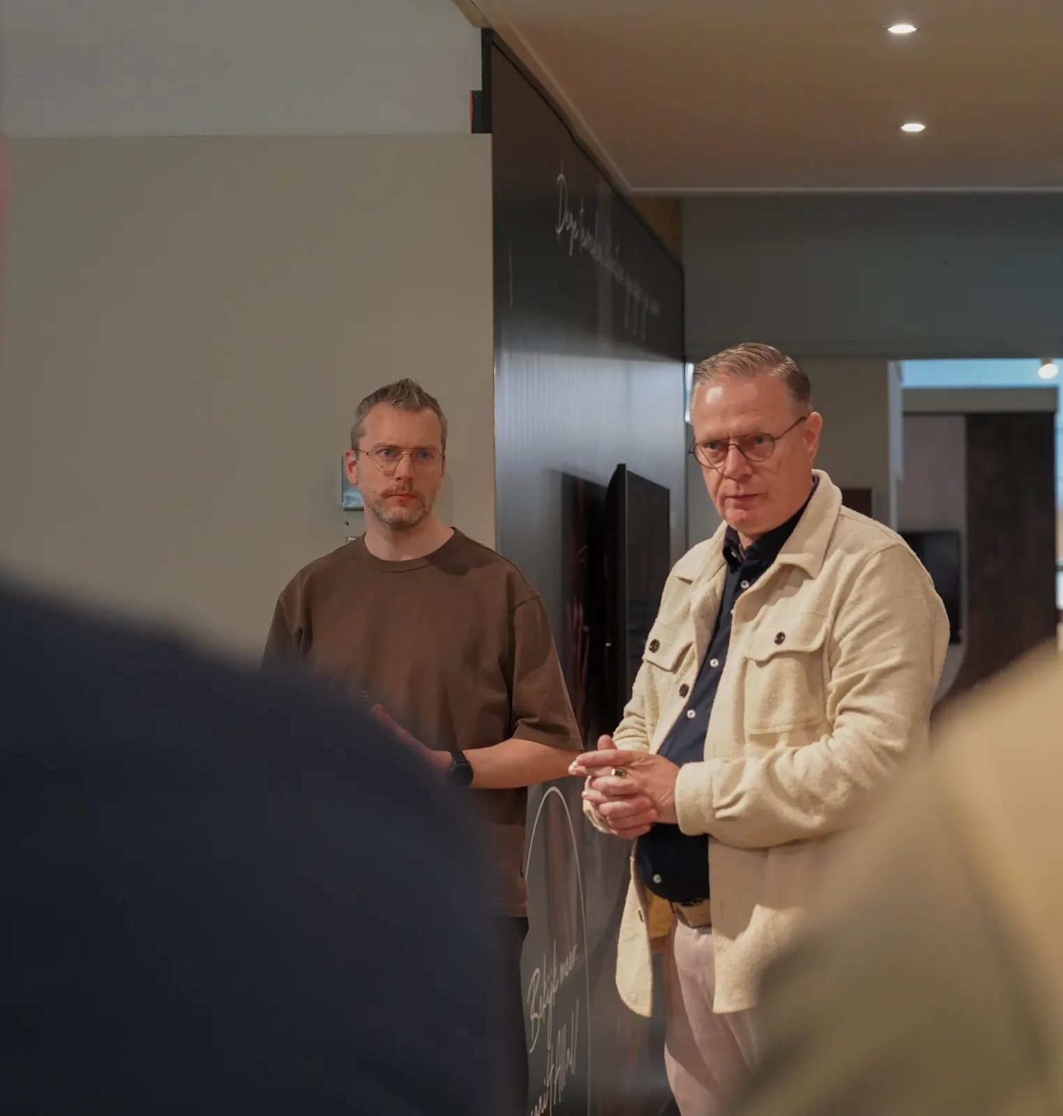 Stef Bosgoed en Lamco de Vries spreken de ondernemers toe op de franchisevergadering